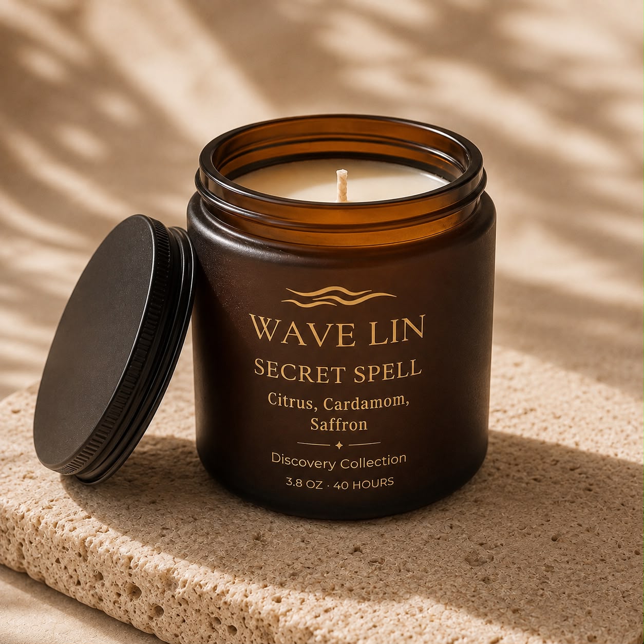 Wave Lin Secret Spell Candle in amber glass jar