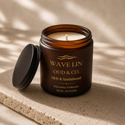 Wave Lin Oud & Co. Oud & Sandalwood Candle in amber glass jar